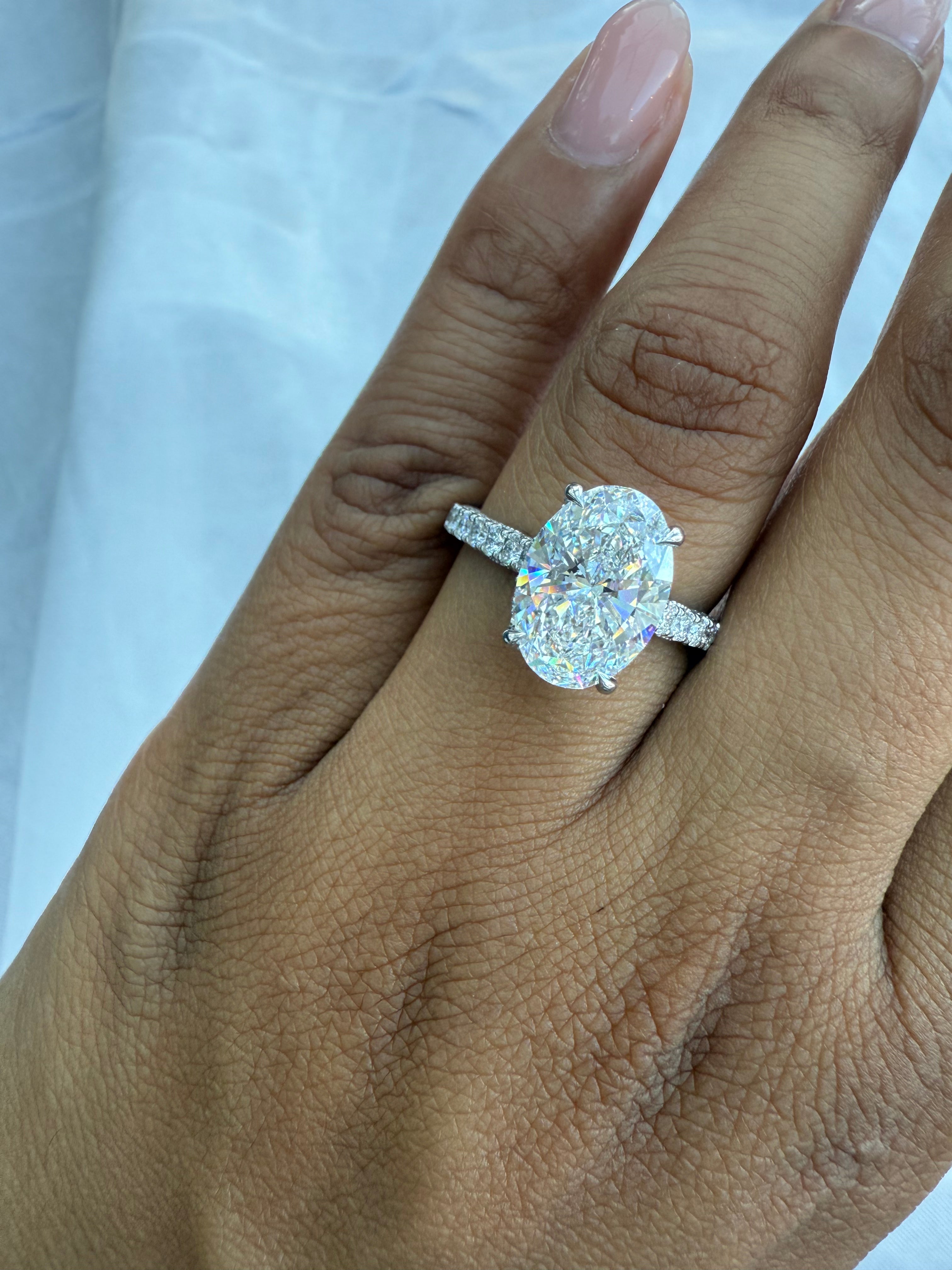 Oval Diamond Engagement Ring with Side Stones