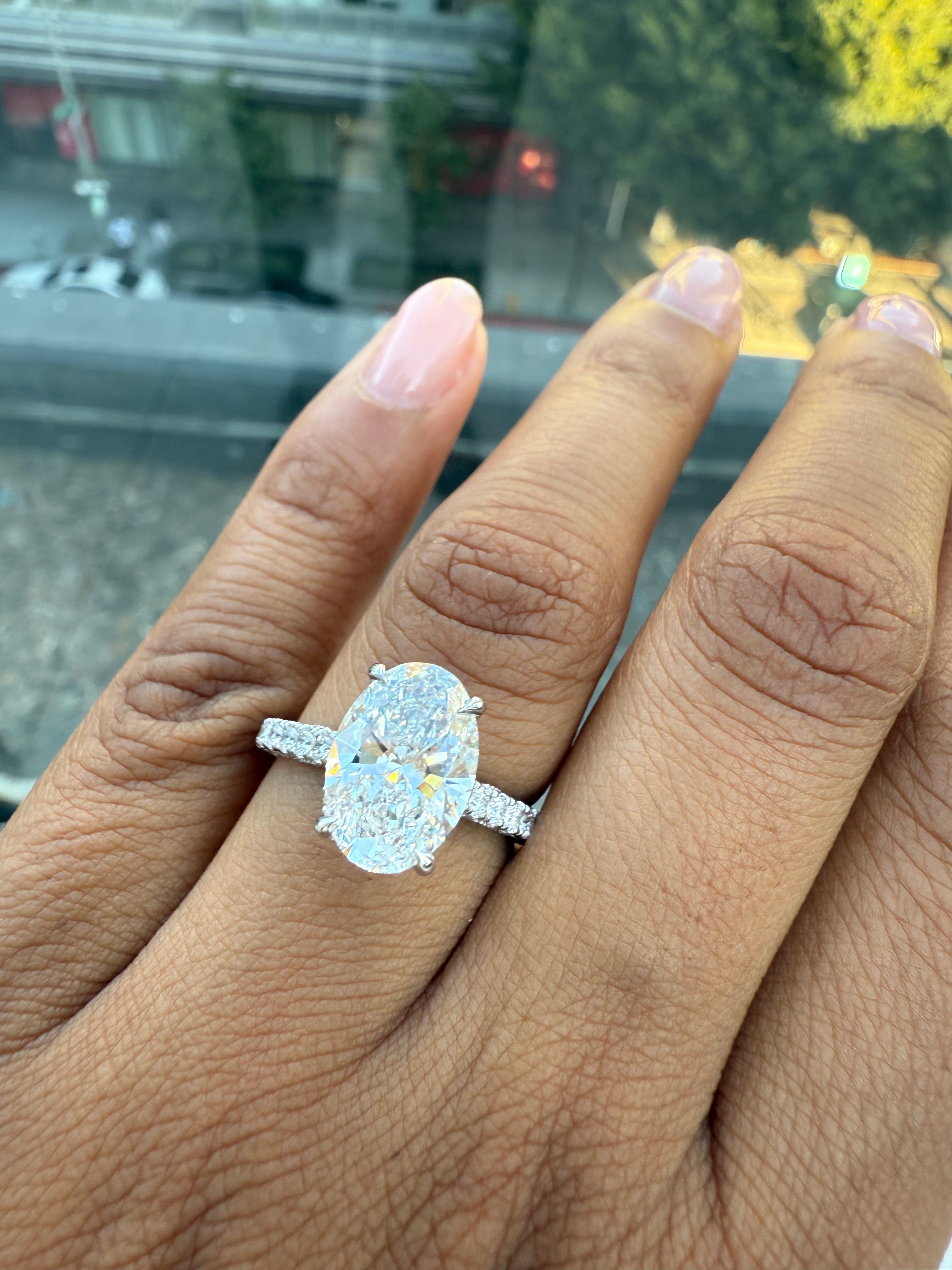 Oval Diamond Engagement Ring with Side Stones