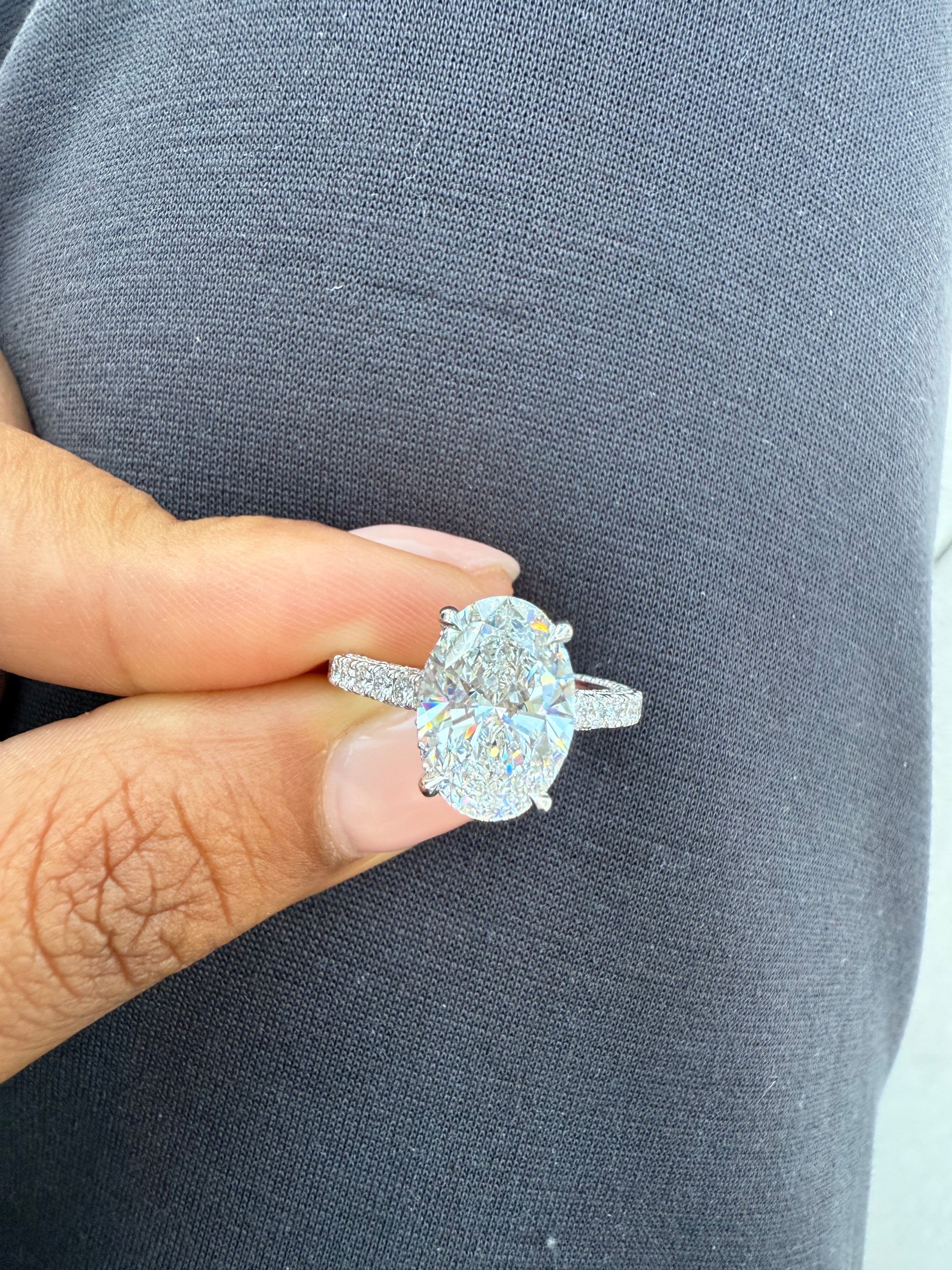 Oval Diamond Engagement Ring with Side Stones
