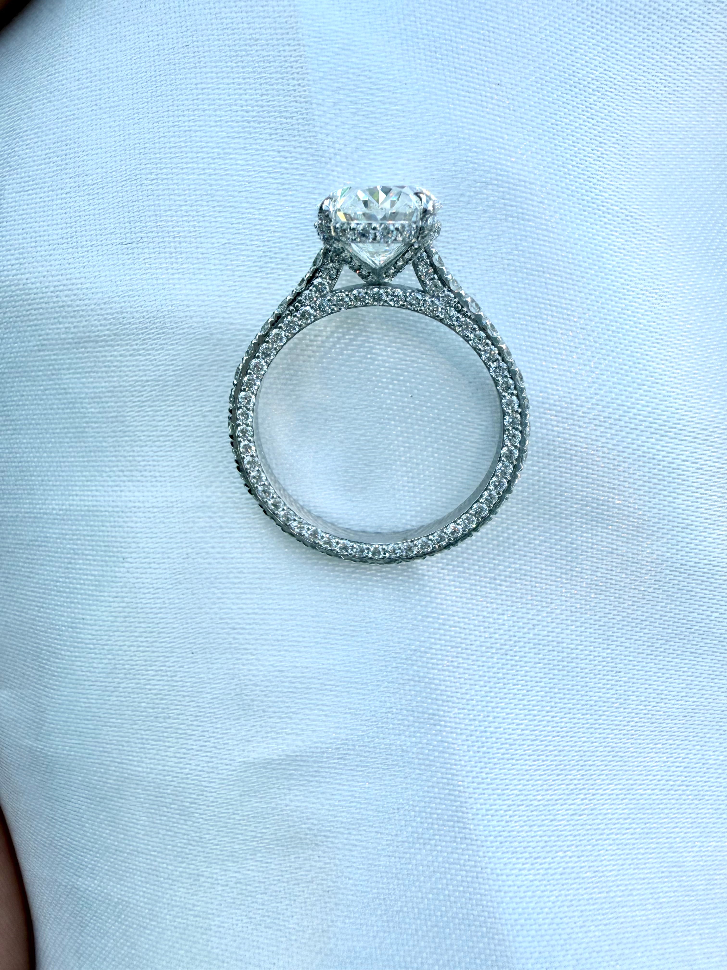 Oval Diamond Engagement Ring with Side Stones