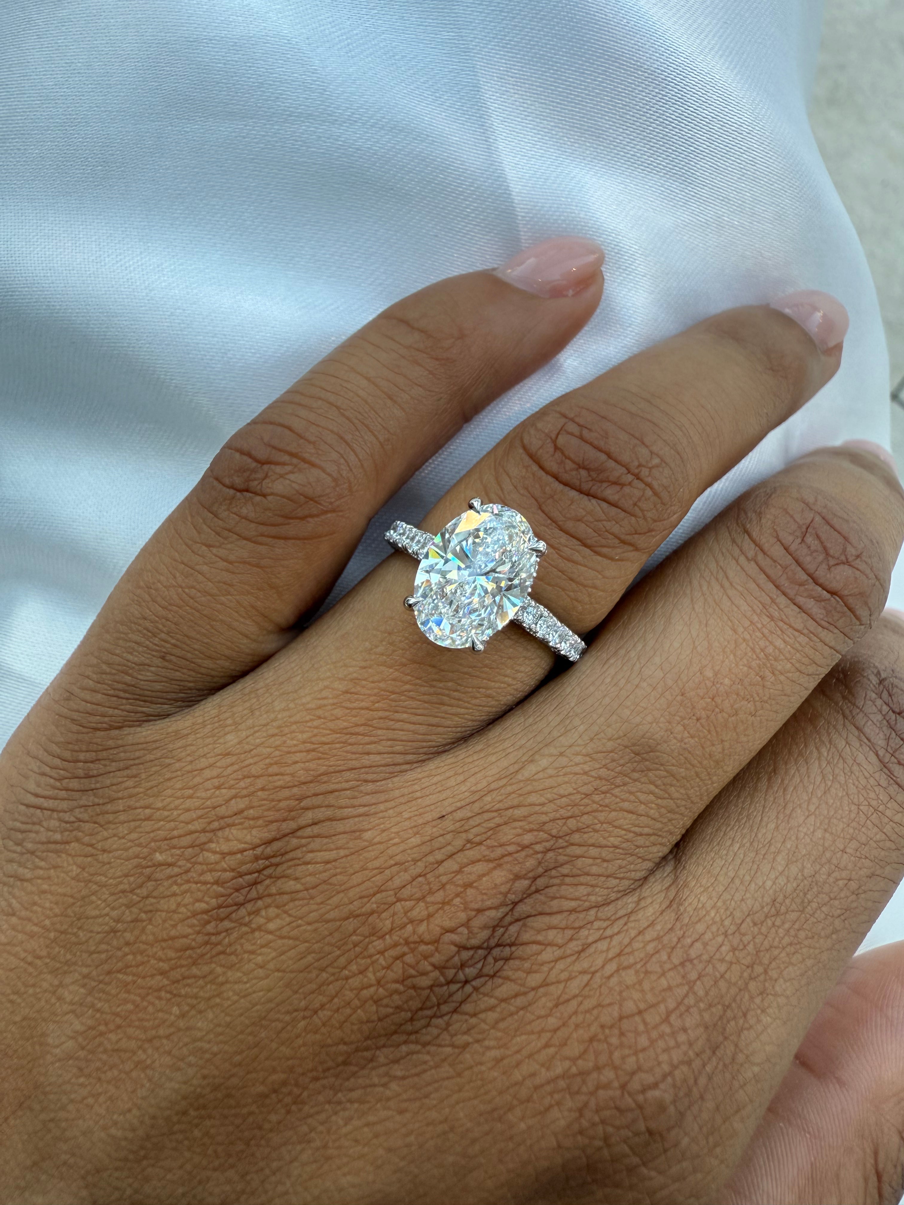 Oval Diamond Engagement Ring with Side Stones