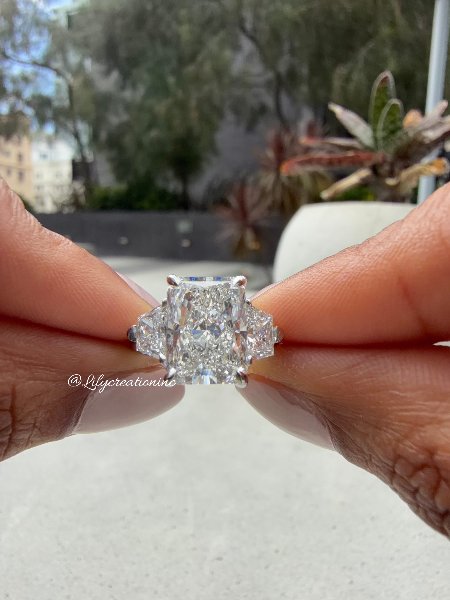Radiant Cut Lab Grown Diamond Engagement Ring with Trapezoid Side Stones