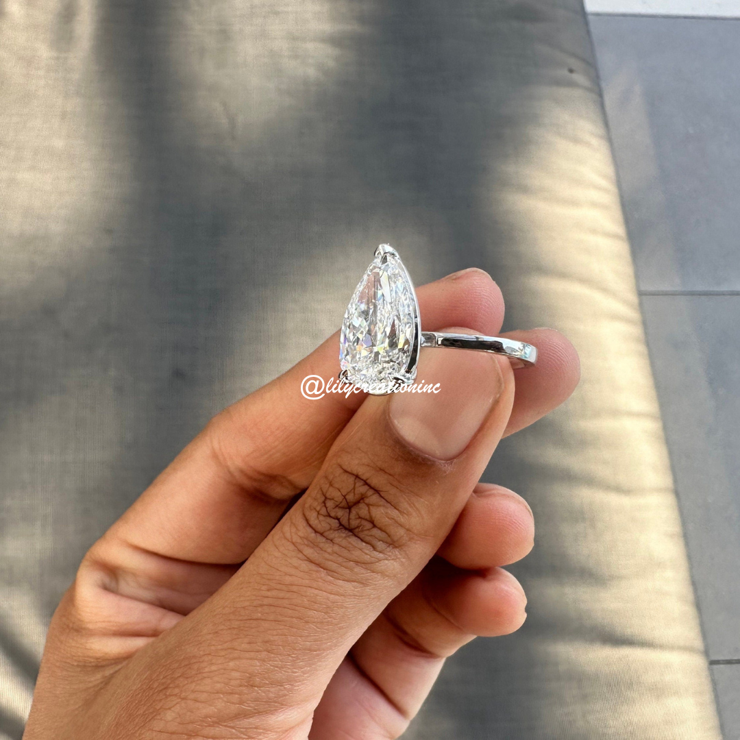 Three-Prong Pear Cut Diamond Engagement Ring