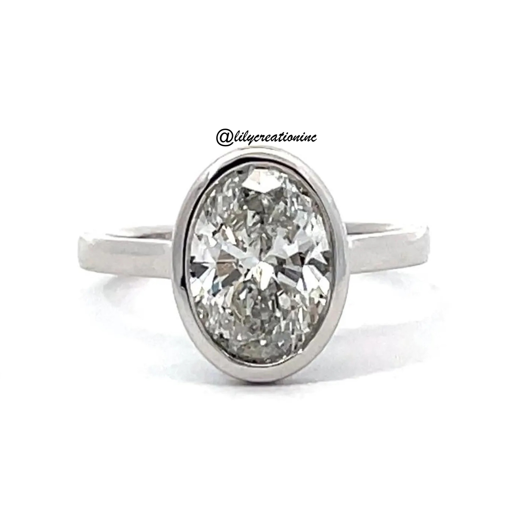 Oval Bezel Set Diamond Engagement Ring
