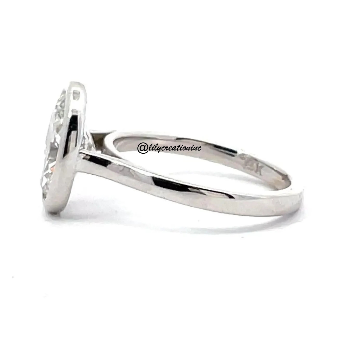 Oval Bezel Set Diamond Engagement Ring