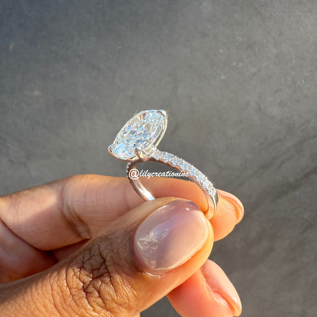 Oval Diamond Engagement Ring With 1/2 Coverage Side Stones