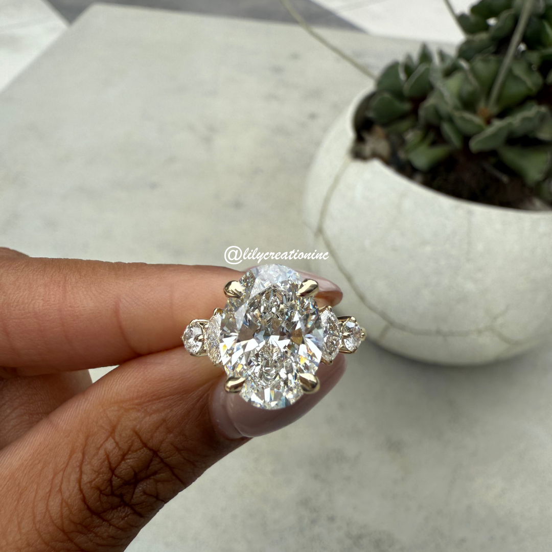 Oval Diamond Engagement Ring With Marquee & Round Side Stones