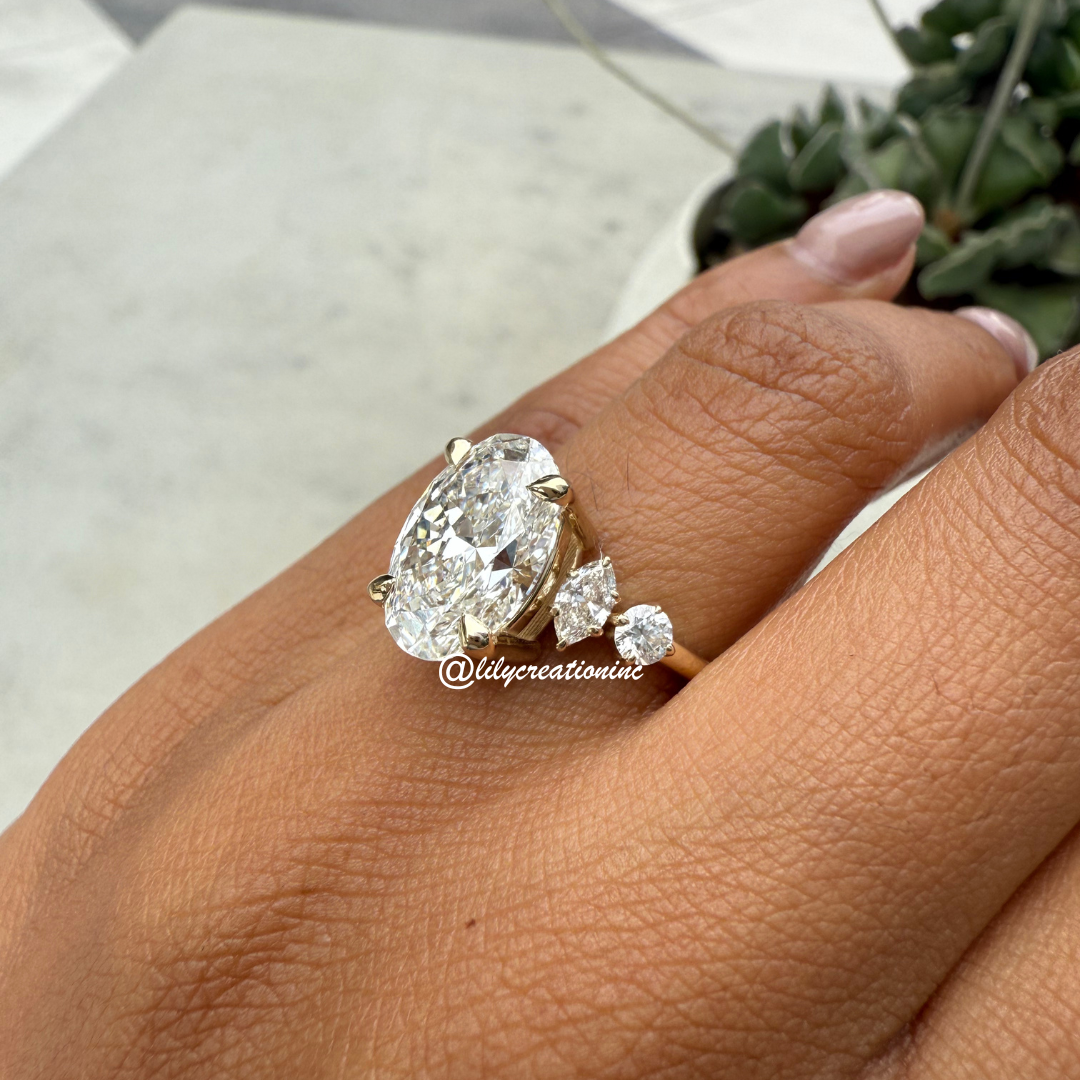 Oval Diamond Engagement Ring With Marquee & Round Side Stones
