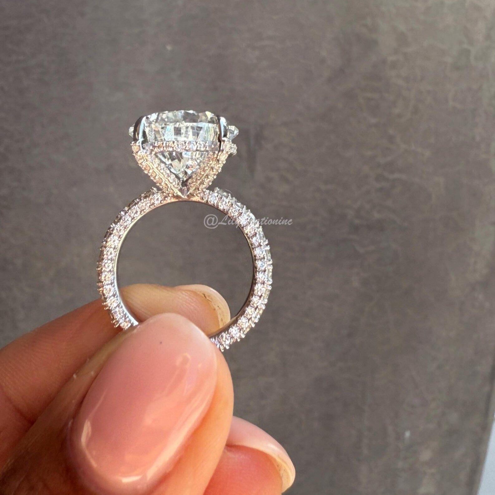 Three-Prong Pear Cut Diamond Engagement Ring With Sid Stones