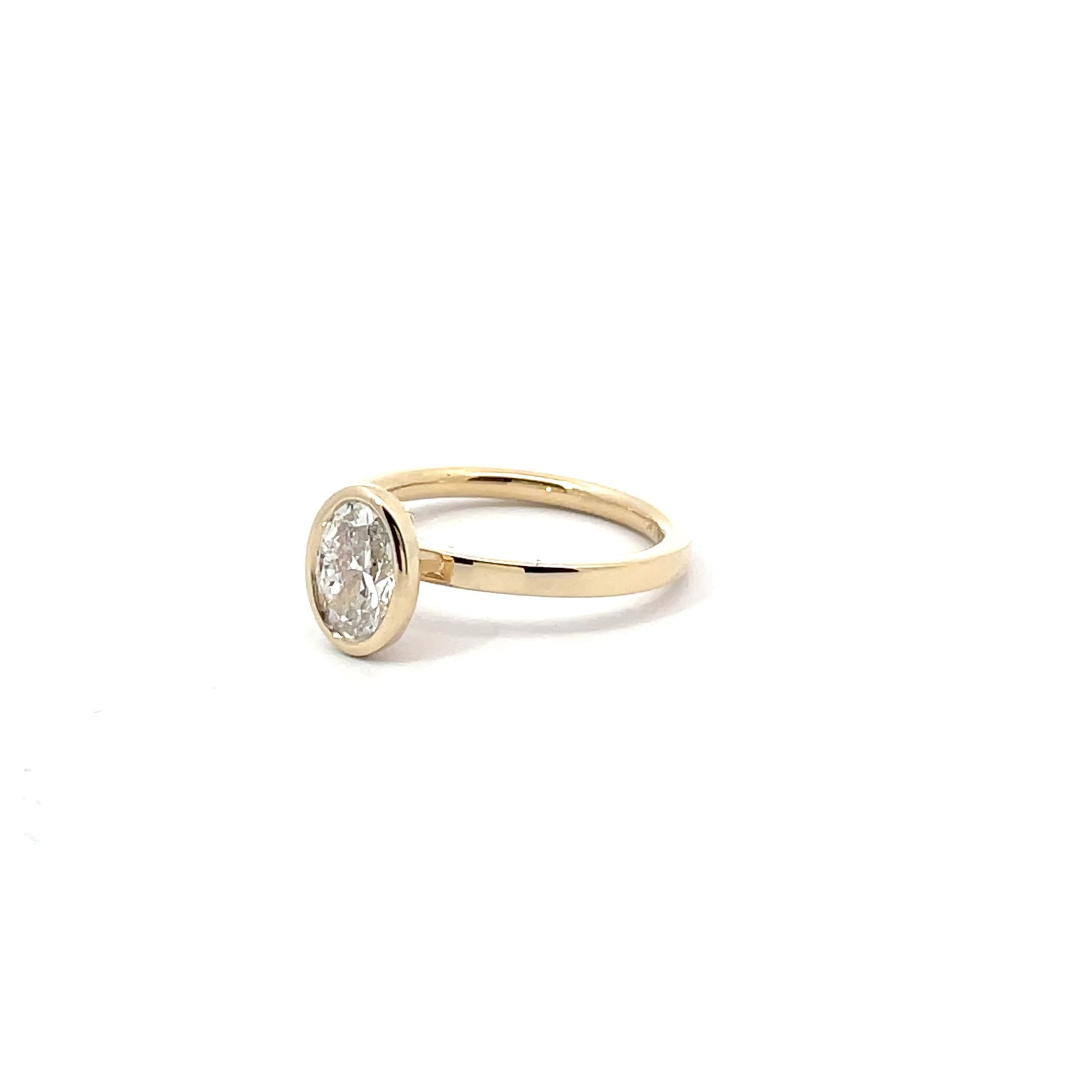 Oval Bezel Set Diamond Engagement Ring