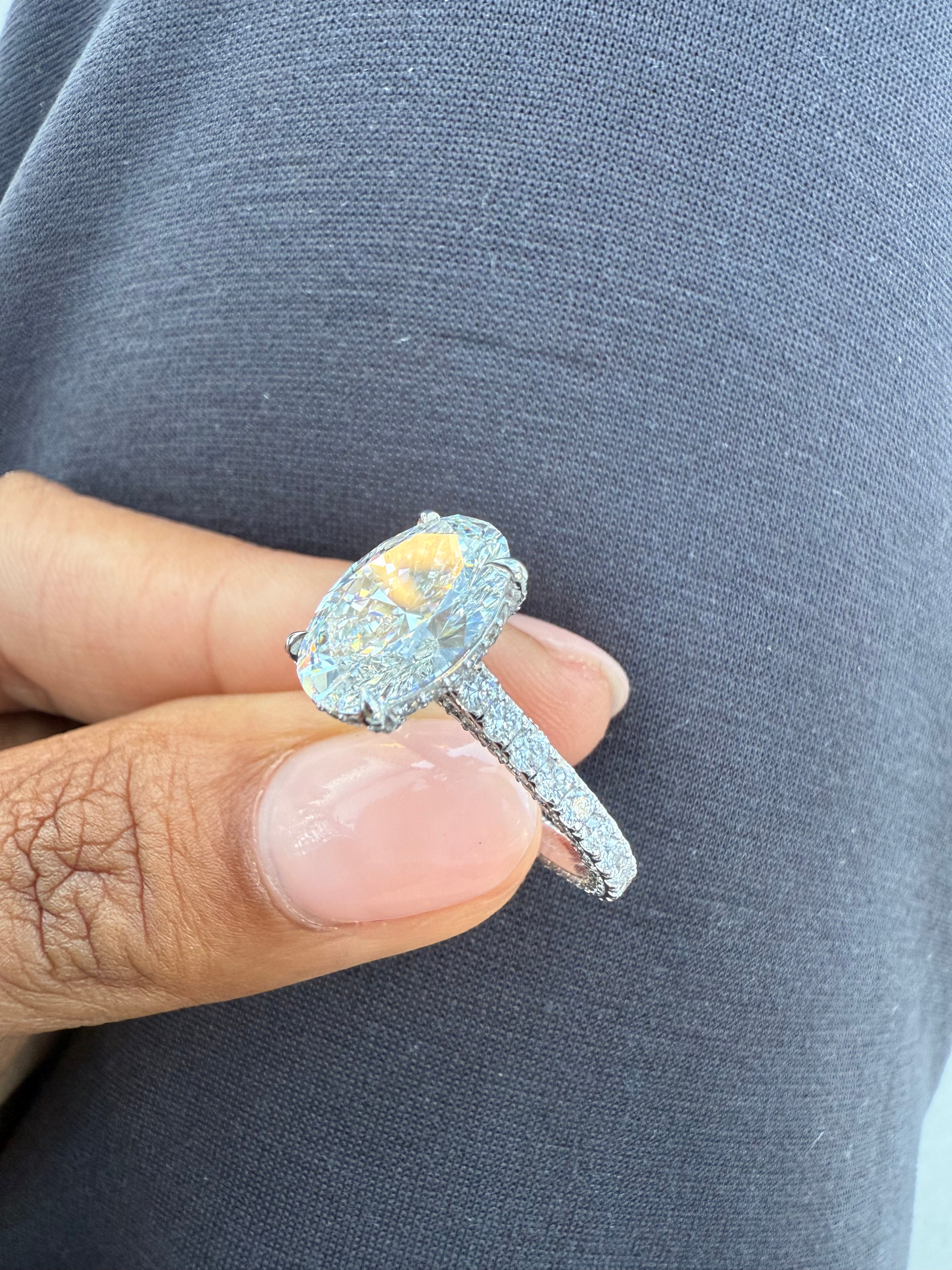 Oval Diamond Engagement Ring with Side Stones