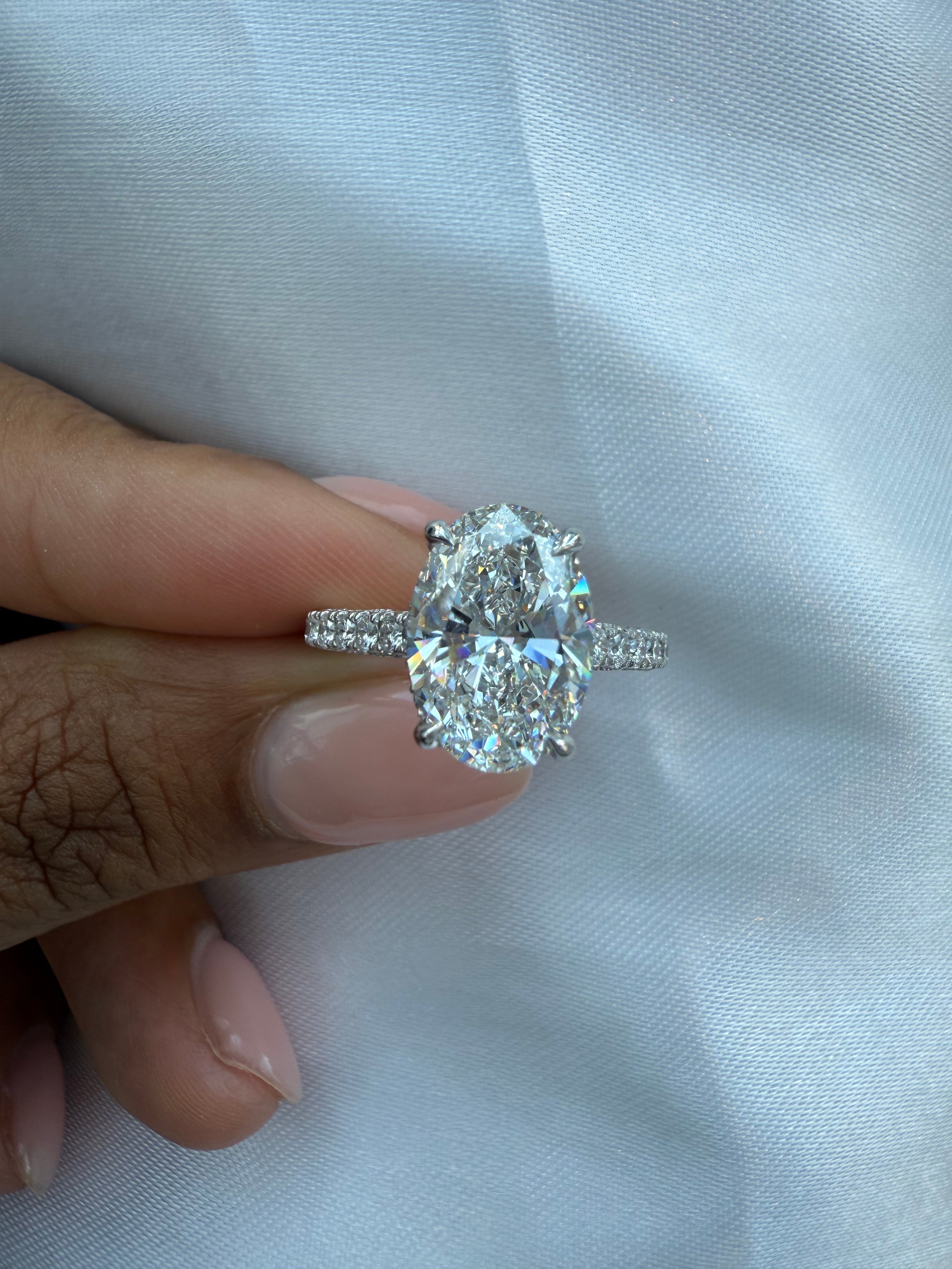 Oval Diamond Engagement Ring with Side Stones
