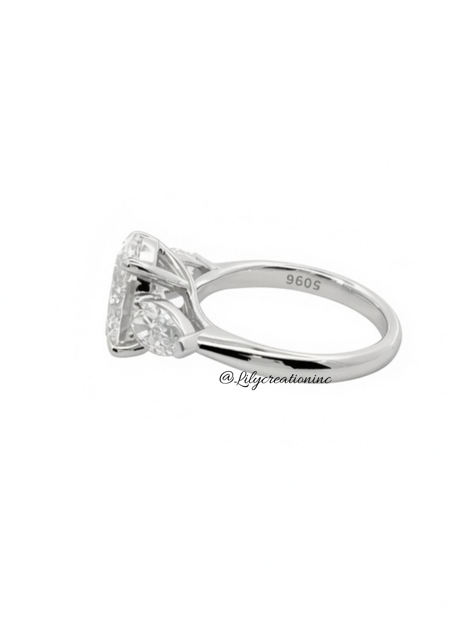 Oval Cut Lab Grown Diamond Engagement Ring with Pear Side Stones