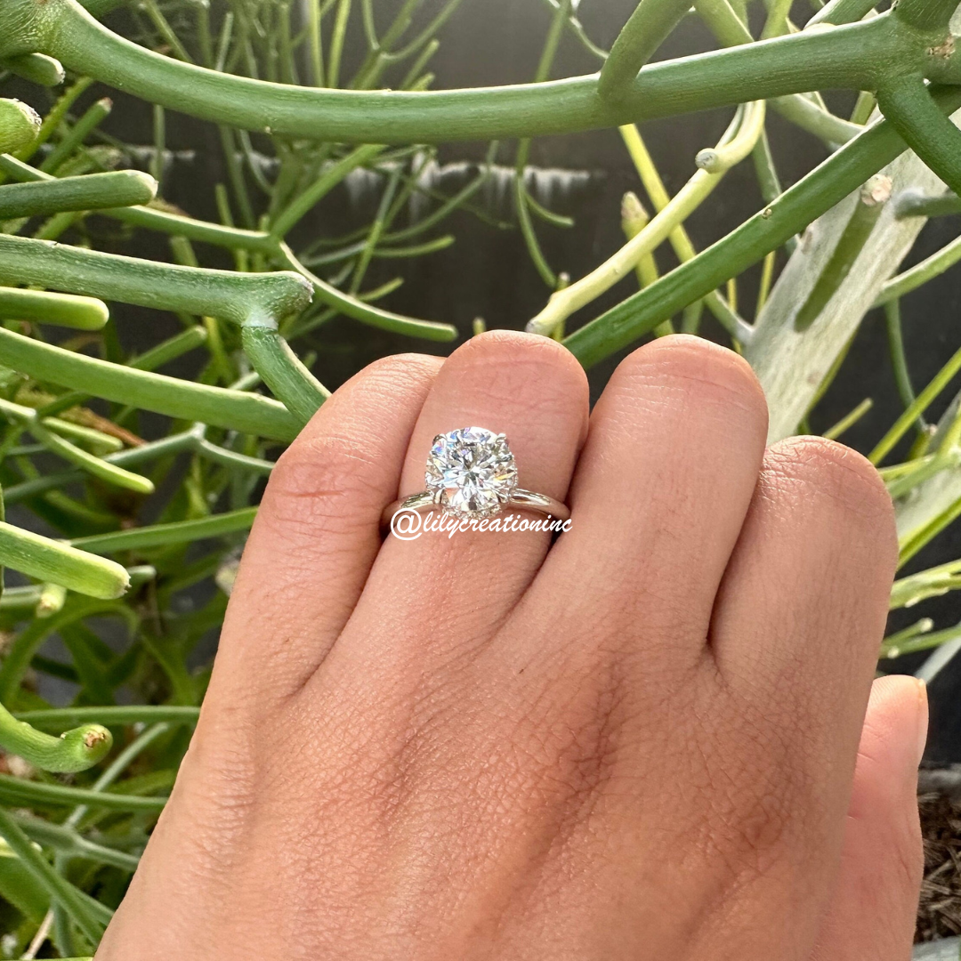 Round Solitaire Hidden Halo Diamond Engagement Ring