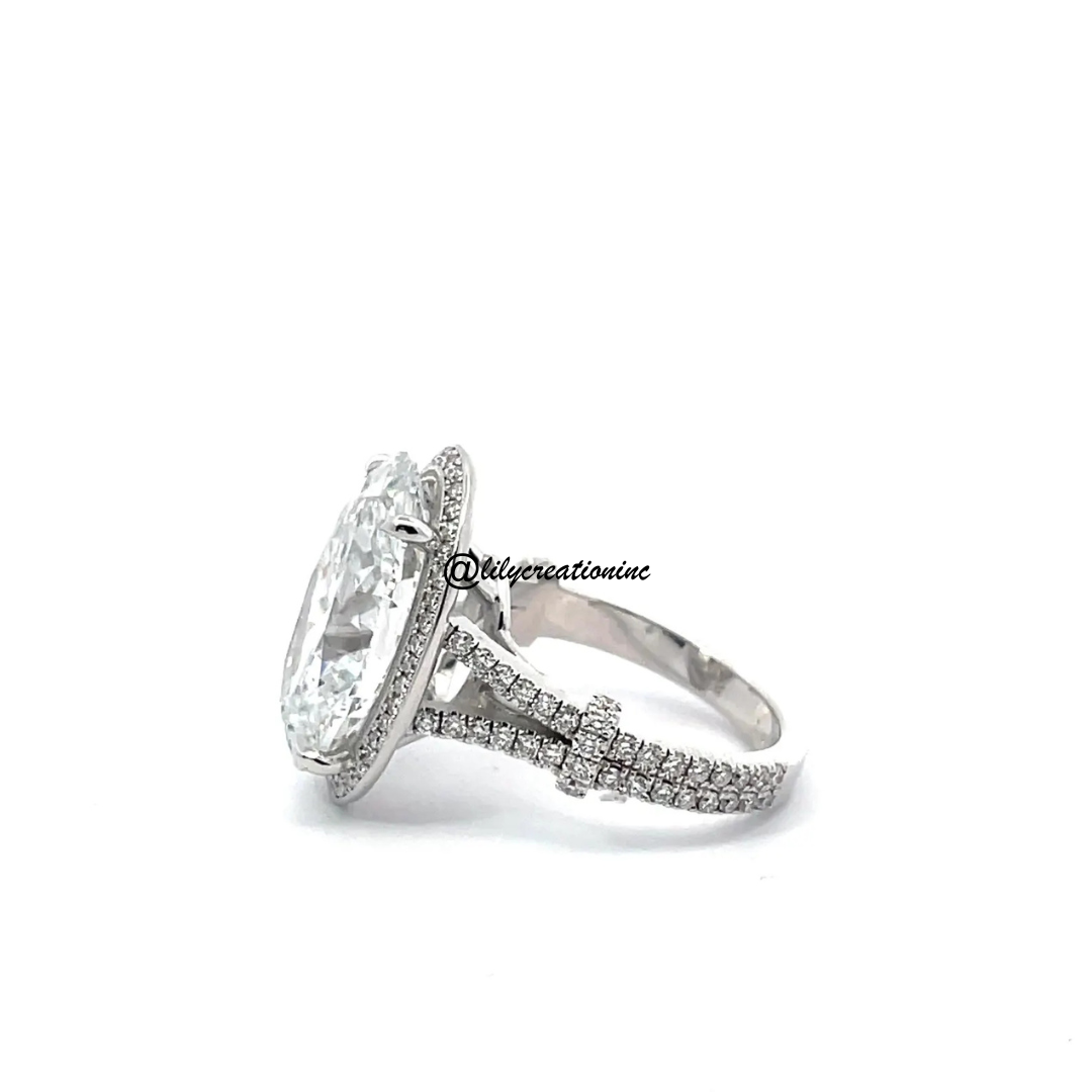 Oval Diamond Engagement Ring With Split Shank and Pave Diamonds