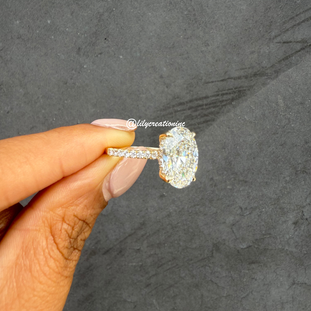 Oval Diamond Engagement Ring With 1/2 Coverage Side Stones & Hidden Halo