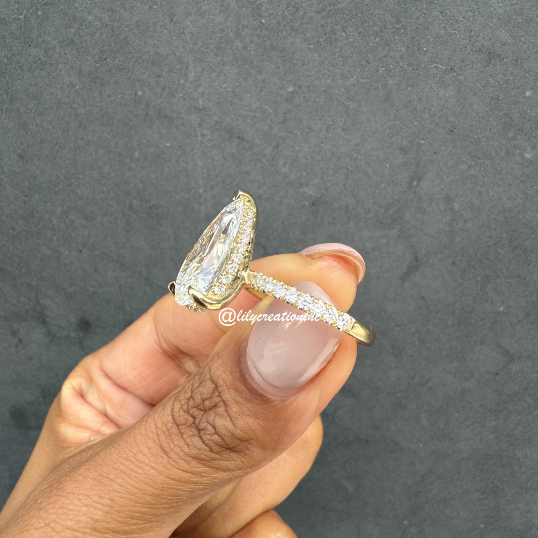 Pear Cut Diamond Engagement Ring With 1/2 Coverage Side Stones & Hidden Halo
