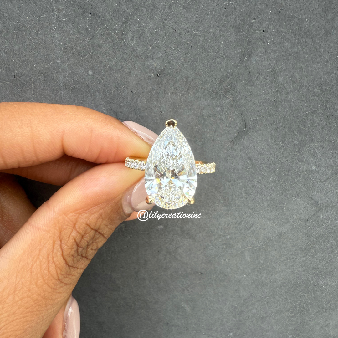 Pear Cut Diamond Engagement Ring With 1/2 Coverage Side Stones & Hidden Halo