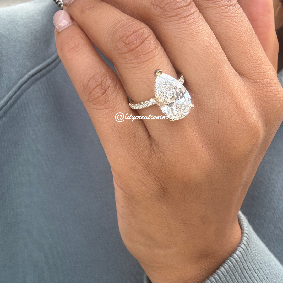 Pear Cut Diamond Engagement Ring With 1/2 Coverage Side Stones & Hidden Halo