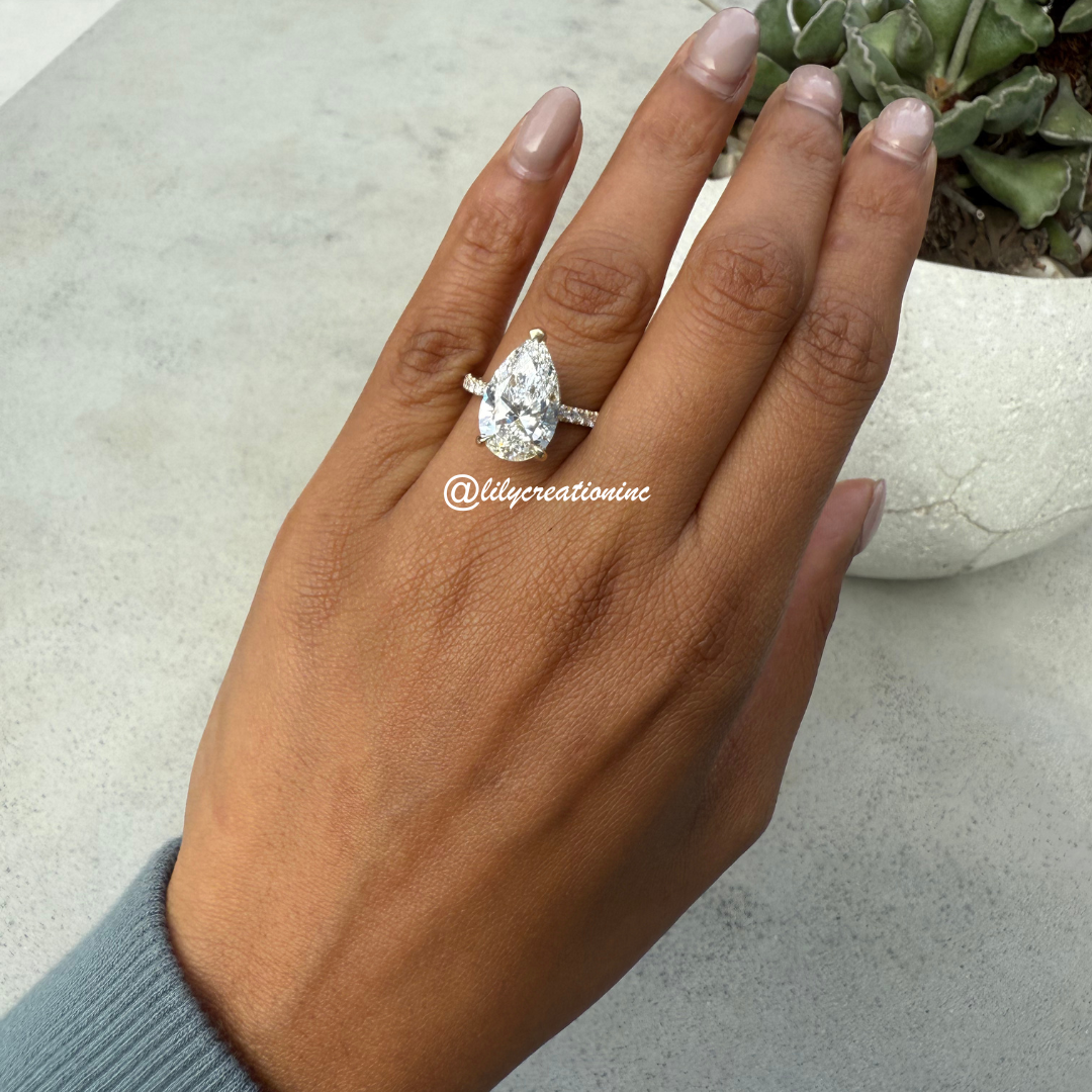 Pear Cut Diamond Engagement Ring With 1/2 Coverage Side Stones & Hidden Halo