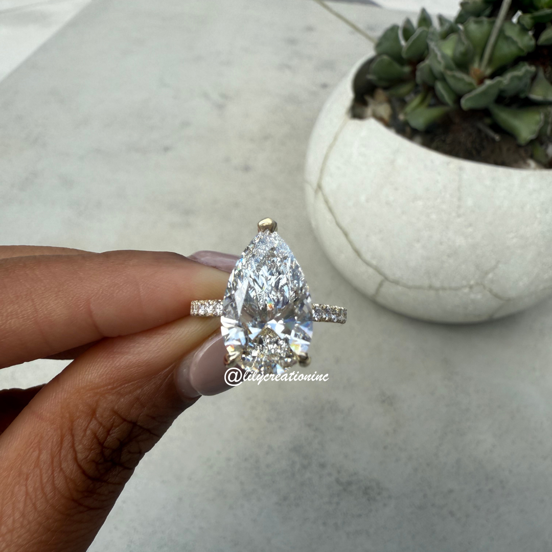 Pear Cut Diamond Engagement Ring With 1/2 Coverage Side Stones & Hidden Halo