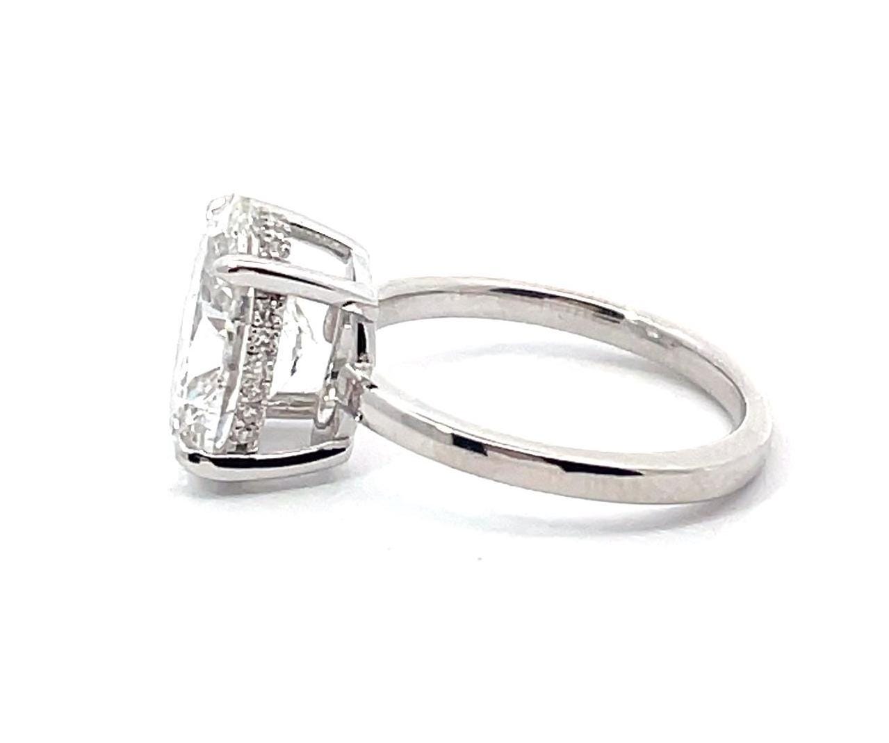 Oval hidden halo Diamond Engagement Ring