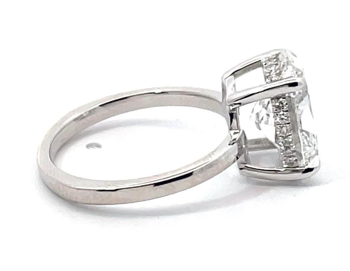 Oval hidden halo Diamond Engagement Ring